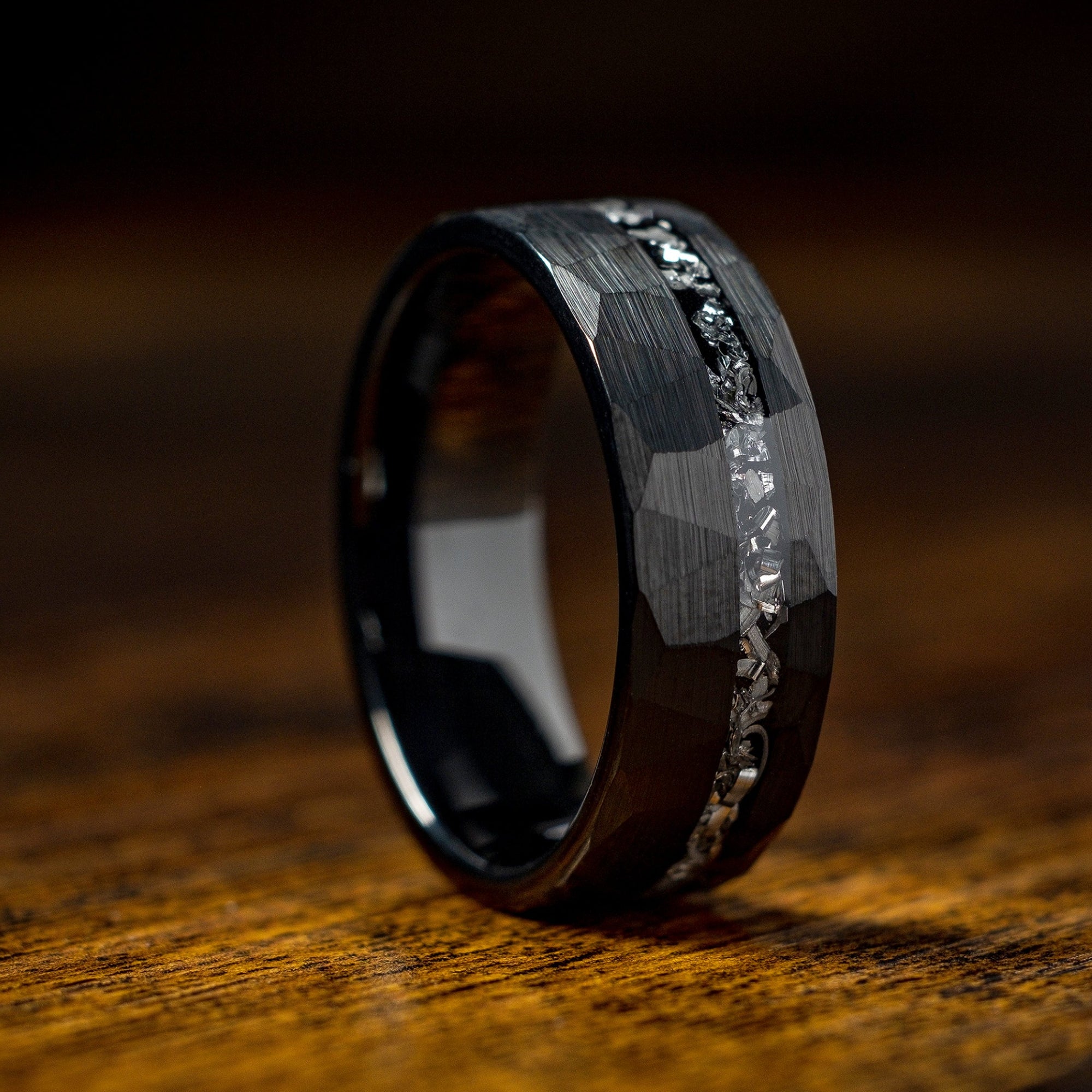 Black hammered ring with meteorite inlay